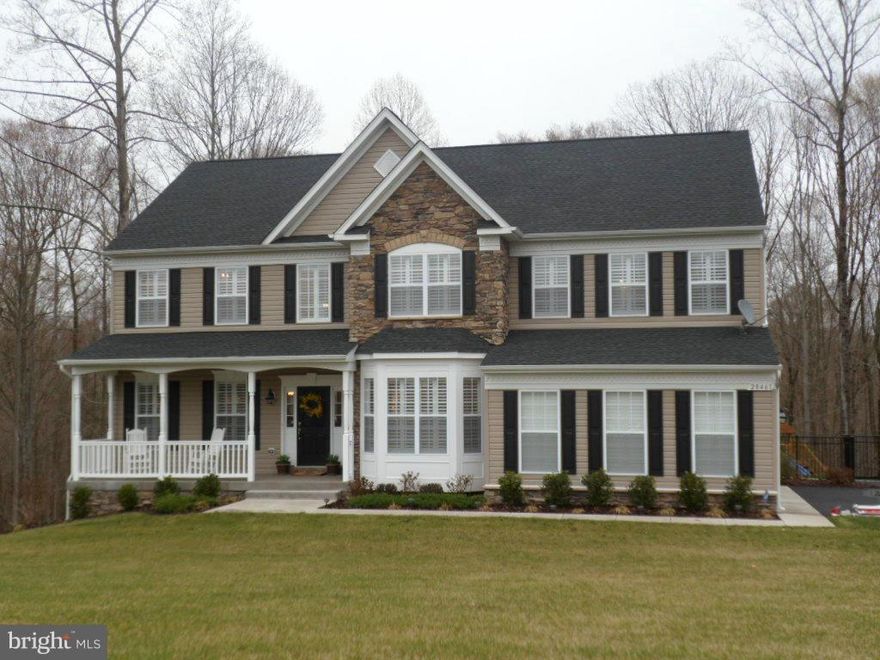 GORGEOUS HOME in Mechanicsville. 5 bedrooms, master suite with sitting room & large walk in closet, 4 1/2 baths, full gourmet kitchen, s/s appliances with wall oven, extra large island, all with granite countertops. Extra bonus room off kitchen that faces the woods & fenced in back yard with fire pit for entertaining. Large stone gas fireplace in the family room. Wet bar w/ sink in basement area.