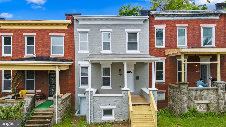 Views for days! Live in luxury within walking distance to Coppin State. FULLY RENOVATED to the studs, this home is a perfect, turn-key investment.  With FIVE bedrooms & 3 1/2 bathrooms, there is plenty of space for a student rental or multi-generational living. The architectural details are amazing. The designer, gourmet kitchen provides endless opportunities for living your best HGTV life. Discover the ultimate entertainment experience in this stunning basement! Boasting a state-of-the-art in-wall surround sound system and multi-colored recess lighting, this space is perfect for hosting movie nights, game tournaments, and more. And with a 100-inch laser TV and Sony home theater receiver included with offers made by June 1st, you'll have everything you need to take your entertainment to the next level. Don't miss out on this incredible opportunity to transform your basement into the ultimate entertainment destination! Multiple decks provide city skyline views. Ethernet CAT-5 wiring throughout the entire property. You've got to see this home to believe it. Schedule your TOUR TODAY. Eligible for ALL financing, including local GRANT PROGRAMS, up to $10K for the buyer!