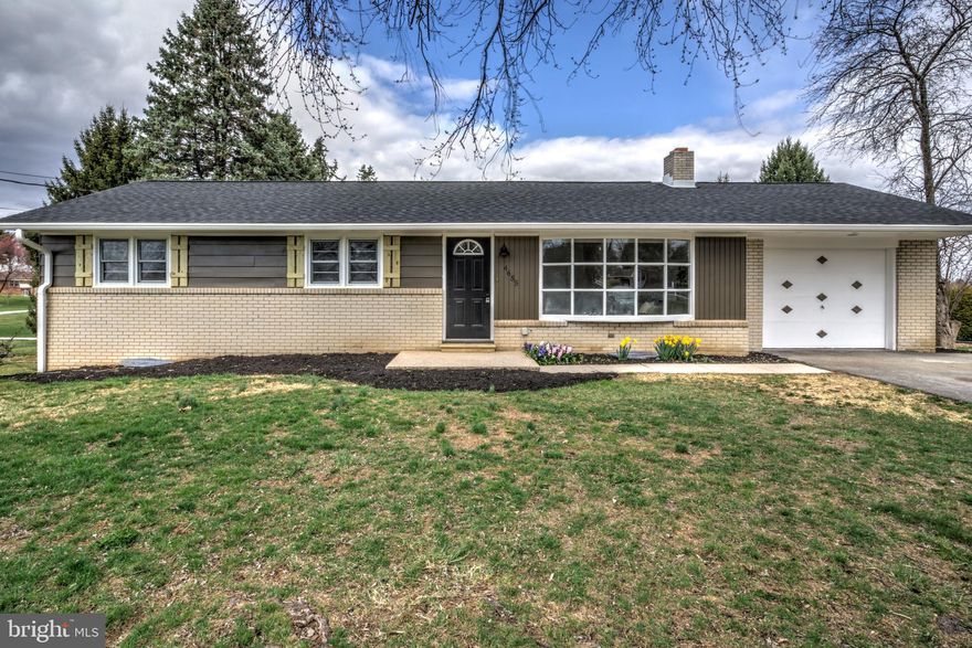 Welcome home to a charming 3 bedroom/2 full bath ranch-style residence with attached garage! Nestled in a desirable, residential area west of York, this home backs to a large park and offers proximity to route 30 for your commute. The home has been completely renovated inside and out with attractive finishings! With features such as an attached garage, bright living space with original hardwoods, and a finished basement with bonus living space; this is a place you’ll want to call home! You will love the high-end kitchen upgrades such as stylish warm toned painted cabinetry, stainless steel appliances, lovely quartz counters, and tile backsplash. Extend your living space into the sunroom (heated and cooled for four season living!). The bedroom wing features more re-finished, original hardwoods, and the full bathroom has been outfitted with a brand new, oversized vanity and a tiled tub/shower combination. The lower level features a large and cozy bonus living space with new carpeting and plenty of windows letting in light. A second full bathroom with walk-in shower and a dedicated laundry room maximize convenience on this level. The unfinished areas are clean and ready for practical storage needs. Additional upgrades such as a brand new architectural shingle roof as well as new rubber roof on the sunroom and new, efficient heat pump HVAC system, as well as many replacement windows and a repaired septic system mean you can live a low-maintenance lifestyle with peace of mind! Vacant and easy to tour, schedule a showing today!