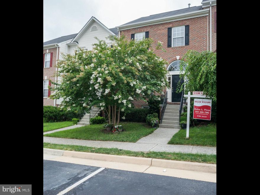 Sunny, bright townhouse with formal living and dining rooms with crown and chair molding and hardwood floors.  Eat in kitchen with island and ss appliances and family area.  Wood deck opens to private backyard.  LL is walkout with full bath, BR and rec room all newly carpeted. Upstairs is a massive master suite with sitting area, recently recarpeted.  Jacuzzi and new porcelain tile floor in MB.