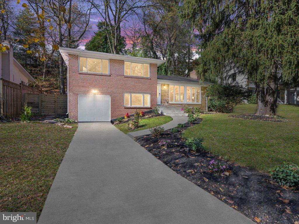 * * A Hidden Gem in Crestwood Welcome to 4334 Blagden Ave. NW, is a rare find nestled on a spacious 7,578 sq. ft. lot in the heart of Crestwood, a picturesque neighborhood renowned for its diverse architectural styles and lush greenery. The home is located just steps from the scenic hiking and biking trails of Rock Creek Park — one of the largest urban parks in the country and only a few minutes away from the Smithsonian National Zoo.
This 2,312 sq. ft. home + 310 versatile semi-finished garage space blends modern design with timeless mid-century charm, offering a distinctive layout and artistic details that set it apart from typical homes in the area. With 4 bedrooms, 3 full bathrooms, an office/den plus a versatile lower level, this property is perfect for those seeking a unique, light-filled residence in a picturesque neighborhood.
* * Key Features: The living room features cathedral ceilings (nearly 11’) and windows that connect you to the majestic pine tree branches cascading over the front yard and frame stunning views of the surrounding nature. Spacious Dining & Kitchen: The dining area, positioned between the living room and kitchen, offers ample space for entertaining with French doors that lead to the backyard. The kitchen features gas cooking, generous storage, and an island perfect for meal prep and social gatherings. Private Outdoor Oasis: Step outside to a newly built 400+ sq. ft. deck that spans nearly the entire width of the house. This expansive outdoor space is ideal for entertaining or enjoying quiet moments in a private, tranquil setting. The backyard includes a newly installed side gate for added privacy.
* * Thoughtful Design: Upper Level Retreat: The principal bedroom includes an en suite bath with a jet-enhanced shower. Two additional bedrooms share a spa-like bathroom with a Jacuzzi tub. Flexible Spaces: A sunlit office/den off the main level is perfect for working from home, a library, or playroom. The attached one-car garage includes additional bonus space — an 8x10 storage room/ walk in closet perfect for seasonal items. Plus, there's rough-in plumbing for an additional full bath if desired.
* * Fully Finished Lower Level: In-Law Suite: The lower level offers complete privacy with a separate entrance, a wet bar, a full bathroom, a large family room, and a sleeping alcove/den. This space is ideal for guests, an in-law suite, or multi-generational living.
* * Location, Location, Location: Crestwood offers the perfect balance of suburban tranquility and urban convenience. Enjoy the peace and serenity of this sought-after neighborhood while being just minutes from downtown DC - eg: 12 minutes from the White House and yet you’ll be steps from Rock Creek Park’s beautiful trails. Local shopping options include Wegmans, Whole Foods, and Giant, with a variety of dining and coffee shops options nearby in Cleveland Park, Mount Pleasant, and 14th St attractions. With easy access to major roadways including the scenic Rock Creek Parkway, this home provides the ultimate urban retreat. Don’t miss your opportunity to own this exceptional property in one of DC’s most desirable neighborhoods!