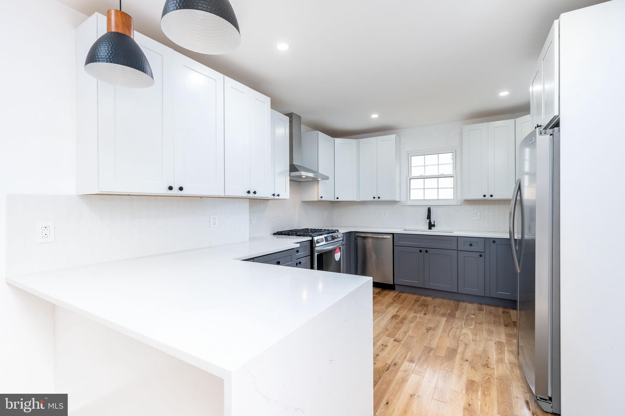 Welcome to this stunning renovated row home sitting on a 17ft wide lot in FISHTOWN, one of Philadelphia's most sought-after neighborhoods. With an approved 10 YEAR TAX ABATEMENT and brand new everything (roof, plumbing, electrical, insulation, flooring, cabinets, you name it) you are not going to want to miss this home set for completion end of January. This beautiful 3 bedroom, 2 full bathroom home boasts 2000 sq ft of above grade living space, perfect for entertaining and relaxation. In a prime location, you'll be just steps from the vibrant Frankford Ave and Girard Ave, featuring an array of trendy restaurants, bars, parks, and shops. The interior of this charming townhouse features beautiful real oak hardwood floors, a massive kitchen with bar seating and a great sized outdoor oasis. Upstairs on the 2nd floor you will find 3 bedrooms (1 is smaller and more of an office/nursery/etc.), laundry closet, and a gorgeous full bath! Ascending to the 3rd floor is your primary suite with large bedroom, bonus closet and walkthrough closet to your serene primary bathroom with double vanity sink and tiled shower with bench.
This home offers the perfect blend of comfort and convenience, with a traditional style that's perfect for those looking for a unique living experience. As a resident, you'll enjoy being steps from hotspots like Suraya, La Colombe Coffee Roasters, Frankford Hall, LMNO, WM Mulherins, Reanimator Coffee, Loco Pez, and Joe's Steaks. Don't miss out on this incredible opportunity to own a piece of Fishtown's charm - schedule a showing today!