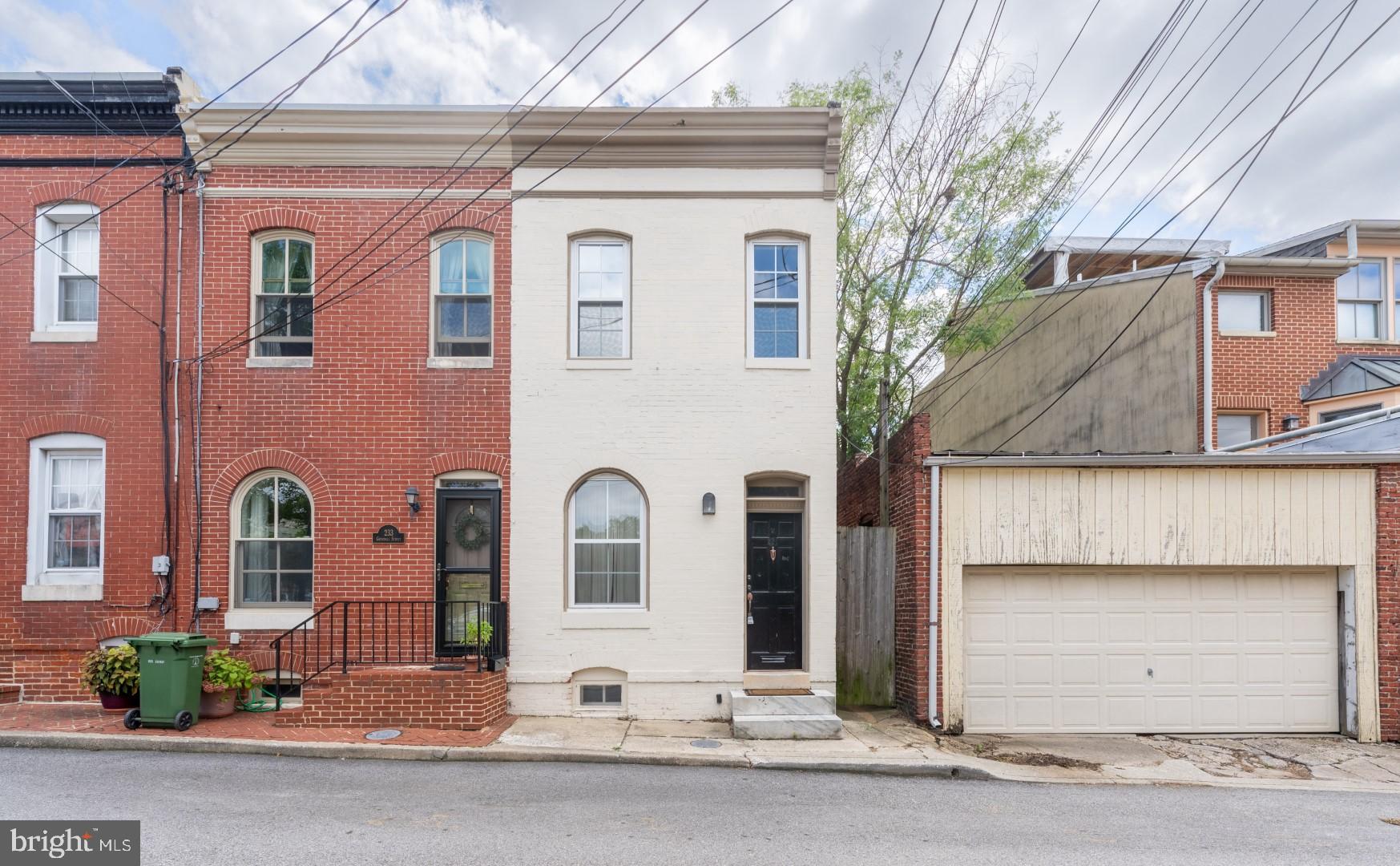 Recently freshly painted from top to bottom! Great Federal Hill location features 2 bedrooms and 1 full bathroom and is available for immediate occupancy with a 1+ year lease. This end of group townhome has great natural light, hardwoods, and a finished basement. Enjoy warm weather meals on the deck! Cozy fireplace in the living room, dining area opens to the kitchen for easy entertaining. Washer & dryer included in the basement. No pets preferred.