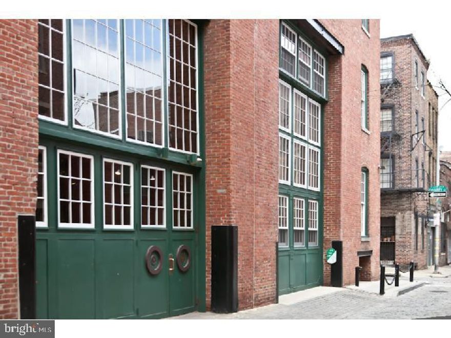 Welcome to 136 N Bread Street Unit 234 at The Castings, a hidden gem nestled on N Bread St in one of the most vibrant neighborhoods in town, Old City. This esteemed condominium building exudes charm and boasts its very own park-like outdoor space. Discover serenity in this peaceful bi-level condo featuring 2 bedrooms and 1.5 baths, thoughtfully upgraded with a touch of elegance.

Step into the well-appointed kitchen, where modern design meets functionality. Quartz countertops, sleek stainless steel appliances, a convenient trash compactor, and 42" custom cabinets with built-in additions create a culinary haven.

The living and dining area is a harmonious blend of style and comfort. Glistening hardwood floors grace the space, complemented by expansive windows that flood the room with natural light. Immerse yourself in a cinematic experience with the built-in surround sound home theater, complete with a Bose sub-woofer.

Retreat to the spacious and luminous master bedroom, offering abundant closet space for your belongings. The bathroom is a testament to luxury, adorned with ceramic tile, Kohler fixtures, and a seamless glass enclosure showcasing dual shower heads and a custom tile floor.

With a focus on energy efficiency, this condo boasts a brand new HVAC system and newer tilt-in windows. Stay comfortable while reducing your carbon footprint. Additional storage space can be found in the basement, along with dedicated room for two bicycles, catering to an active and organized lifestyle.

Nestled in the heart of this vibrant community of Old City, The Castings presents a unique opportunity to enjoy a serene living experience with the best of urban conveniences at your doorstep. Don't miss out on the chance to call this exceptional condo your own. Schedule a viewing today and envision yourself in this remarkable home.
