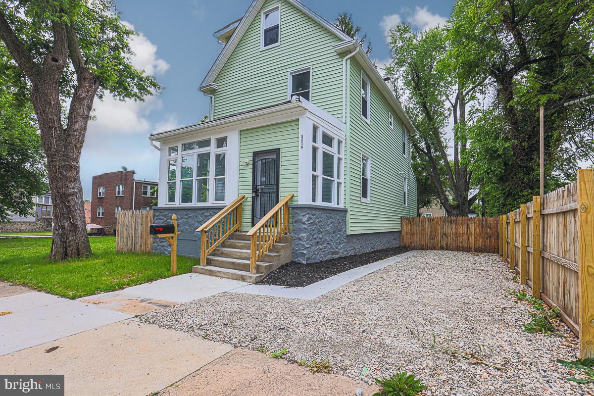 Welcome to 5216 Florence Avenue, Baltimore, MD 21215! Discover this beautifully renovated single-family home in the Arlington neighborhood of Baltimore City. This expansive residence offers 6 spacious bedrooms and 4.5 bathrooms across four finished levels, providing ample space for comfortable living. The main level features an open floor plan with a bright living area, a dining room, and a modern kitchen equipped with granite countertops, a kitchen peninsula, and stainless steel appliances. A convenient half bath with a double sink completes this level. The second floor includes three bedrooms and two full bathrooms, including a luxurious master suite with a custom tile shower. The third floor adds two more bedrooms and a full bathroom, while the fully finished basement offers a private bedroom, a full bathroom, and walkout access.
Additional features include an enclosed front porch, a fully fenced backyard, and a driveway providing off-street parking for up to three vehicles. Recent updates encompass new flooring, electrical, plumbing, HVAC systems, and a new roof, ensuring a move-in-ready experience. Situated in a convenient location with easy access to local amenities, this home combines modern upgrades with classic charm. Don't miss the opportunity to make this exceptional property your new home.