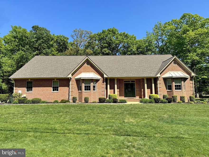 Welcome to this beautifully maintained 4-bedroom, 3.5-bathroom home, offering a perfect blend of comfort, luxury, and convenience. Nestled in a small neighborhood on a dead-end road, this almost 4,000sqft home features 1.5 levels of thoughtfully designed living space, ideal for families of all sizes.  From the entrance, step into the spacious living room, complete with 9' ceilings and a cozy gas fireplace. The connecting family room/sun room is filled with abundant natural light from large windows that overlook the backyard. Enjoy gatherings and dinner parties in the elegant dining room. The chef’s kitchen boasts hardwood floors, granite countertops, stainless steel appliances, an eat-in area, an appliance garage, a step-in pantry, and pull-out shelves in the cabinets. The master suite is a true retreat, located on the opposite side of the home for maximum privacy. It features two walk-in closets, a large soaking tub, a custom vanity and mirror, a linen closet, and skylights. Two additional bedrooms share a convenient Jack and Jill bathroom, while the upper level offers a fourth bedroom/loft area, a full bathroom, and an unfinished storage/utility area. Convenience is key with a laundry room located near the master suite, a conditioned workshop/utility area with water access attached to the house, and a 2-car garage with door openers. The roof is only 4 years old, ensuring peace of mind for years to come. Two sheds with electric (12x20 and 10x12) provide ample storage space. Outdoor living is a delight with a private patio area under the pergola, beautifully landscaped yard, and a full-yard sprinkler system. The whole house generator ensures you’re never without power. This home combines modern amenities with timeless charm, making it the perfect place to create lasting memories.