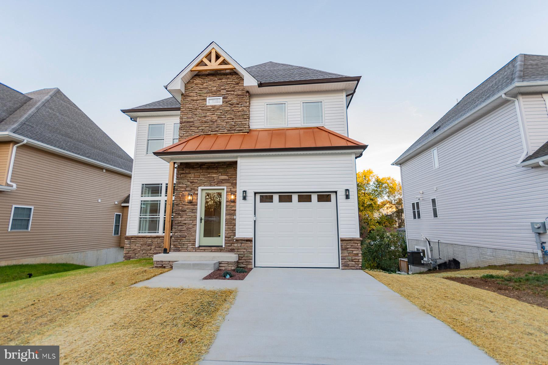 Seller is offering 2 years of high-speed internet and 2 years of home monitoring through Simplisafe with an acceptable offer.
Welcome to this beautiful brand-new construction—a four-bedroom, 2.5-bath home that combines modern amenities, ample space, and timeless design, just steps away from both the MARC train and historic downtown Martinsburg. This home offers over 1900 finished square feet of heated living space, with an unfinished basement ready for future growth, including a convenient full bath rough-in.
Upon entering, you’re greeted by 10-foot ceilings that enhance the airy, open feel of the main floor. The kitchen is a true centerpiece, featuring premium cabinetry, sleek natural stone countertops, and all smart appliances to make cooking and entertaining a breeze. Adjacent is a dining area (10’ x 10’) that flows seamlessly into the spacious 15’ x 13’ living room. Here, you’ll find an inviting natural gas fireplace and oversized windows, filling the space with warmth and natural light. The main level also includes a convenient half bath and a garage with an EV charging station—perfect for today’s eco-conscious homeowner.
Upstairs, the top level maintains a sense of comfort and convenience with its 8-foot ceilings. You’ll find three versatile bedrooms—two at 10’ x 13’ and one ideal for an office at 10’ x 11’—along with a full hall bathroom and a dedicated laundry room. The primary suite is a true retreat, with dimensions of 13’ x 15’ and a cozy sitting area next to a second gas fireplace. Its en suite bathroom features a stunning 31” x 7’ tiled walk-in shower, a 60” alcove soaking tub, and a double vanity with furniture-quality finishes. Completing the suite is a spacious 7’ x 7’ walk-in closet with plenty of room for all your storage needs.
Stepping outside, the exterior of the home shines with a mix of stone façade and premium vinyl siding, creating a curb appeal that blends style and durability. Double-hung windows add a touch of elegance, and the 15’ x 8’ deck is ready for morning coffees or evening gatherings.
Whether you’re seeking a smart home that accommodates your modern lifestyle, a prime location for easy commuting, or simply a peaceful haven, this property has it all. Don’t miss the chance to make this impressive new home your own!