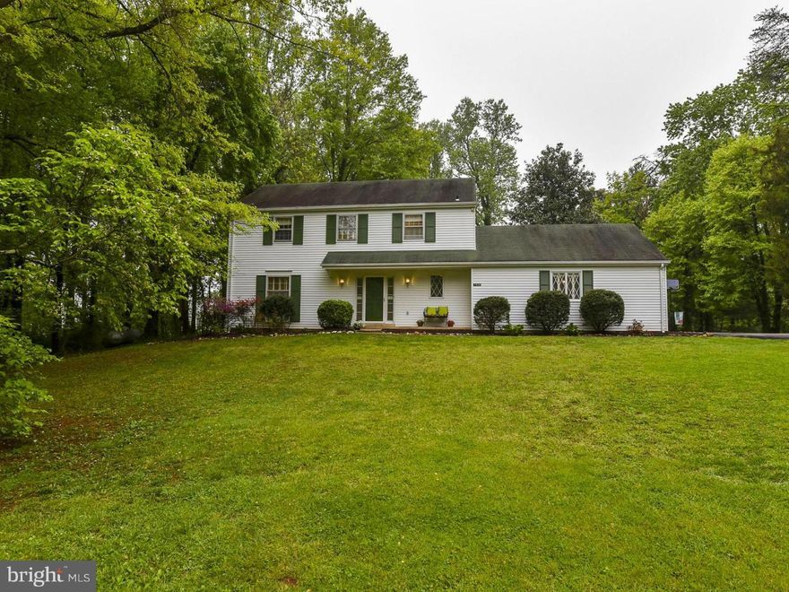 Nestled on PRIVATE 1.03 treed lot!  GLEAMING HDWDs on main/up lvls & stairs!  SPACIOUS Living Rm w/SUNLIT Wins Opens to Dining Rm w/NEW light!  Kitchen w/AMPLE cabs, updated applis & barstool overhang opens to Brkfst Nook & Family Rm!  Family Rm w/COZY FP opens to patio area.  HUGE Master BR w/sep Master BA! Updates--HVAC, HWH, toilets, light fixtures, fans, garage door & more! Excellent schools!