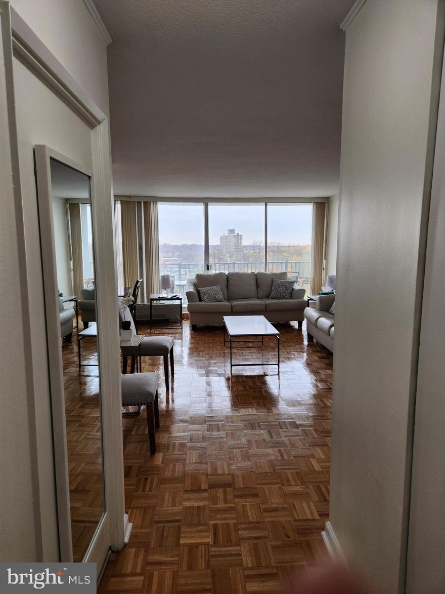 Beautiful 2 bedroom, 1. 5 bath condo overlooking Belmont Village.  A stone's throw from Fairmount Park, Lincoln Drive, I-76, Philadelphia Zoo, Mann Music Center, Target, Fresh Grocer, Dollar Tree, Septa routes 40 and 38 and much more.  Gorgeous parquet flooring throughout and hushed, neutral toned decor in all rooms.  Separate laundry room with newer washer and dryer included.  This unit has loads and loads of closet space.  Master En Suite is roomy and beautifully updated.