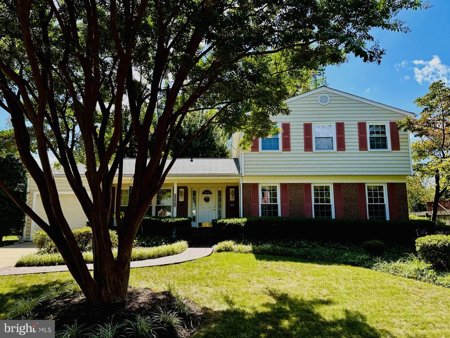 Welcome home to this well kept, updated and freshly painted home in Milway Meadows.  You'll love the warm hardwood floors throughout the main and upper levels, cozy wood burning family room fireplace, formal dining room and expansive living room.  The kitchen has been updated to include stainless steel appliances and granite counter tops.  Upstairs you will find a four bedroom floor plan with two full baths.  The primary en-suite bedroom has been expanded into the adjoining bedroom to create a sitting room/dressing area.  The wall could be easily replaced if four separate bedrooms are desired. The rear of the home has a wood deck with pergola above for privacy as well as a detached shed.  Tailored brick hardscaping adorns both the front and rear of the home. An unfinished basement and large main level mudroom with full size laundry and attached garage complete the package.  Appian Court is a quiet cul-de-sac close to major commuting routes such as the GW Parkway and Route 1.  Welcome home!