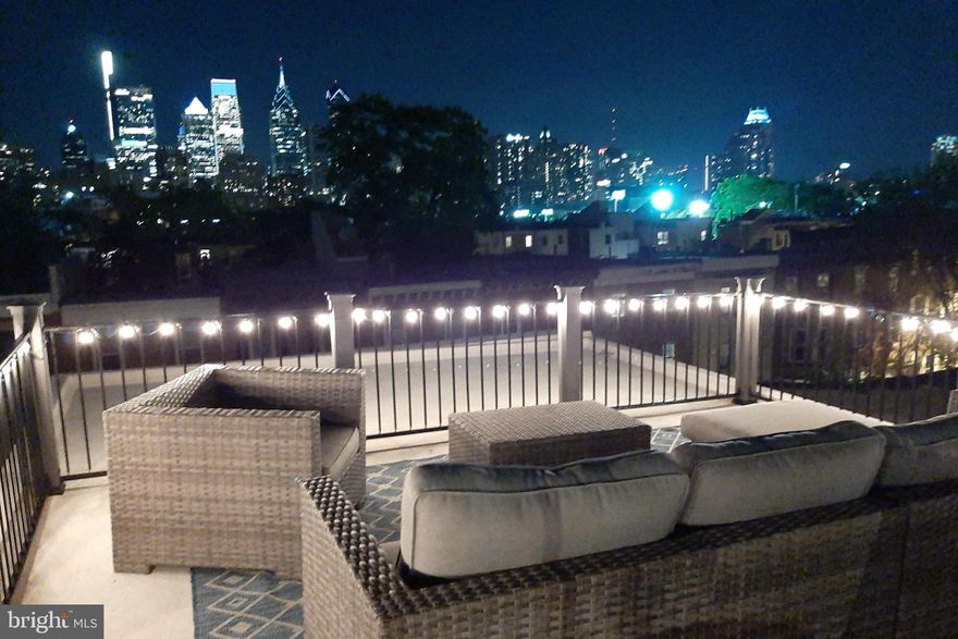 Unrivaled skyline views of Philadelphia can be yours at this modern one-bedroom, one-bath condo in the heart of the city. The generous open concept floor plan is lined with stunning hardwood flooring, large windows, and a tasteful color pallet, making the space feel larger. Prepare meals and create memories in the fully equipped kitchen with modern stainless steel appliances, granite countertops, and a lovely tile backsplash. The kitchen is open to the dining area and living room, allowing traffic flow to move easily when entertaining. 
 
Gather your friends and family on the weekends to enjoy the scenery from the rooftop deck with room to enjoy meals or play card games as you watch the sunset and gaze at the dazzling city lights. Notable highlights include large closets, new fixtures, a workspace for those who work from home, and a well-designed bathroom. This condo is within walking distance of parks, coffee shops, Chew Playground, Chester A. Arthur School, restaurants, and other area businesses, making it easy for you to truly enjoy your new neighborhood and immerse yourself in the local culture. Close in time to start the summer of 2022 off in your own home!  Can be used as a permanent residence or a short-term rental investment.  All furniture and furnishings are negotiable.