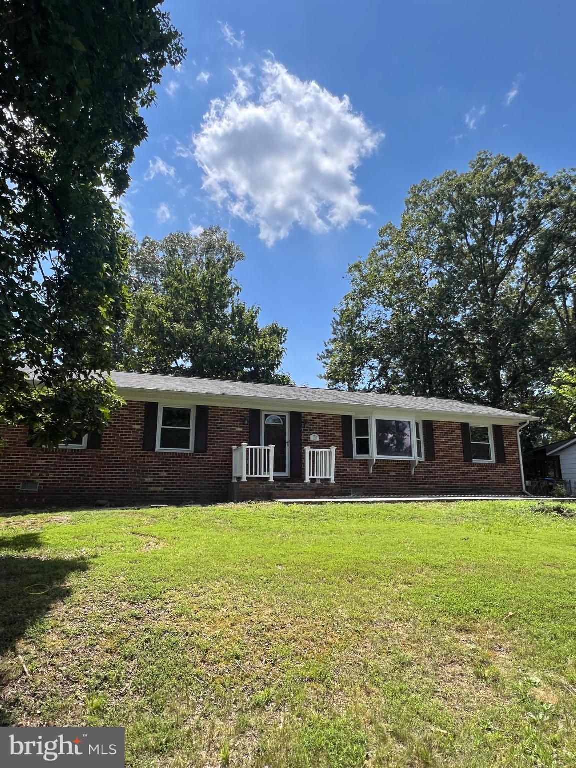 OFFERING $5,000 in closing credits for new appliances. Welcome to 410 Deerwood Drive, a beautifully maintained all-brick rambler located in the established Morningside subdivision of Fredericksburg. This one-level home offers 1,680 square feet of comfortable living space, featuring three spacious bedrooms and two full bathrooms. Thoughtful updates include a remodeled kitchen completed in 2019 with quartz countertops, upgraded electrical system and panel in 2019, and a new roof installed the same year. A brand new HVAC system was added in 2023, providing energy efficiency and peace of mind for years to come. The home sits on a level lot with no HOA dues, offering freedom and flexibility for the new owner. With generously sized rooms, a bright and inviting living area, and a convenient location just off Route 1 with easy access to I-95, shopping, and dining, this property is ideal for anyone seeking comfort, convenience, and value in the heart of Fredericksburg.