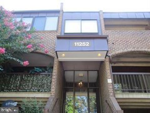 Photo of 11252 Chestnut Grove Square #26, RESTON, VA 20190 (MLS # VAFX2300018)