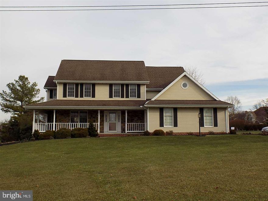 Beautiful Colonial home with solid maple floors, granite counter tops in kitchen, ss appliances, under cabinet lighting, custom molding,  large tiered deck. French doors to formal dining with chair rail, crown molding & wainscoting. Incredible master suite, private shower, walk in closet, whirlpool tub and maple vanity. Wood burning fireplace in family and rec room.
