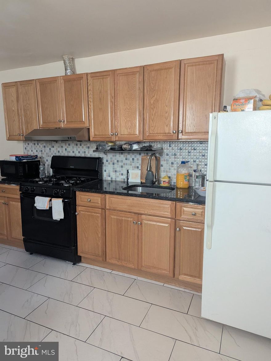 A rare opportunity to invest and own a triplex  in center city with affordable price.  Three 2-bedroom- apartments. One block away from Washington Ave and Italy Market. Building is in good bone and just renovated about 4-5 years ago. It is fully occupied with very good tenants and all rents are current and under market value. the total projected rent is about $5500. The building can be delivered vacant if needed. It can be your very good investment assets. Easy to show but needs 24 hours notice to tenants. Seller is motivated. Give it a try.  Attention: Knock before using keys to enter the apartments. Do not touch tenants' belongings.