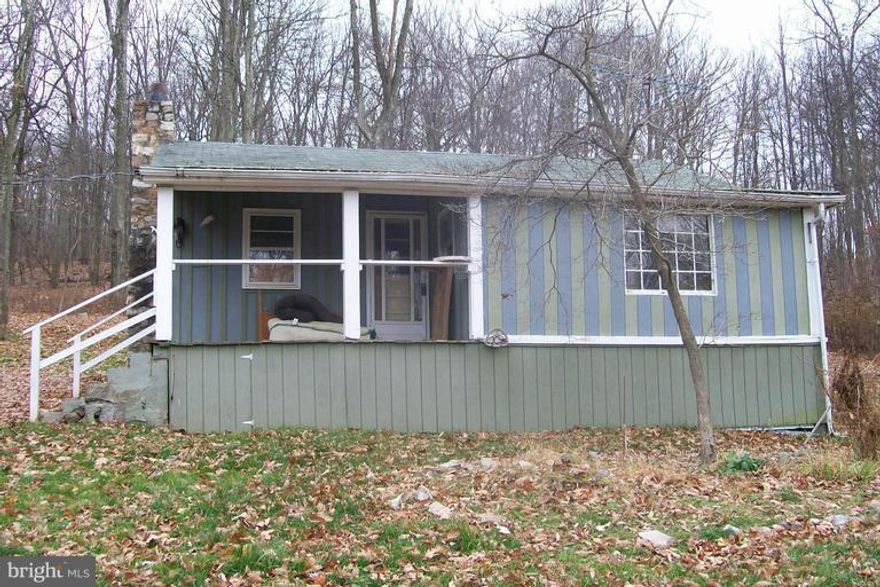 Looking for that weekend get away or the place to live away from all the traffic?  Situated on over 3 acres for your privacy. Needs some TLC but could be made into the perfect place to relax.  Owner says bring all offers.....they are open to owner financing also.