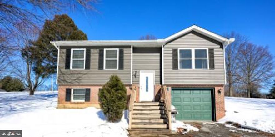 Beautifully situated on a .95-acre lot facing a scenic horse farm, this home offers peaceful views and privacy. The open floor plan includes two main-level bedrooms and laundry for easy living. The spacious primary suite features an en-suite bath and its own separate living area—ideal for in-law quarters, guests, or a private flex space.