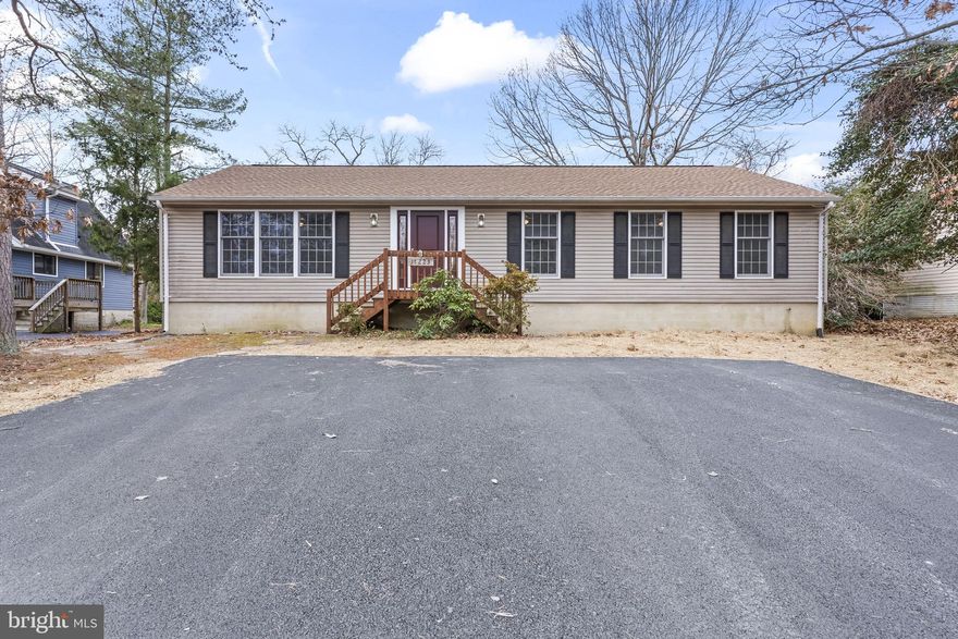 **SELLER WILL CONSIDER CLOSING HELP TO A BUYER WITH AN ACCEPTED OFFER**  ASK ABOUT 100% FINANCING WITH THE MARYLAND MORTGAGE PROGRAM OR USDA LOAN  GET IN THIS HOME WITH ZERO MONEY DOWN** BUYER COULD NOT PERFORM SO WE ARE BACK ON THE MARKET ALL INSPECTIONS WERE COMPLETED AND THE APPRASIAL SO WE KNOW THIS HOME IS A GREAT ONE! 

This is one of those homes that makes you stop and say, “Wait… all of this is included?” A huge rambler with a fully finished basement, tons of recent upgrades, and space that just keeps going—this home delivers incredible value and flexibility for the price.

From the start, the big-ticket updates are already done for you: a newer roof, HVAC, water heater, luxury vinyl plank flooring, updated appliances, fresh paint, and an improved driveway. Translation? You can move in, exhale, and start enjoying the home instead of planning projects.

Out back, the home backs to the golf course, perfectly positioned along the fairway. It’s set far enough back to feel peaceful and private while still giving you a beautiful, open view—morning coffee and sunset evenings here are hard to beat.

Inside, the main level feels bright, open, and welcoming. The oversized living and dining rooms make everyday living comfortable and entertaining easy. The kitchen is spacious and functional, with the laundry conveniently nearby. Three well-sized bedrooms sit on this level, including a main-level primary suite that truly feels like a retreat. You’ll love the huge walk-in closet, double vanity, soaking tub, and separate shower—it’s the perfect place to unwind at the end of the day.

Downstairs, the fully finished basement opens up a world of possibilities. There’s a second primary bedroom with its own full bath and walk-in closet, making it ideal for guests, extended family, or multi-generational living. This space could easily become an in-law suite or apartment, offering privacy and even the potential for rental income to help offset your mortgage.

The community itself is a bonus—enjoy access to beaches, a lake, camping, and more, all while being close to shopping, restaurants, and PAX. Whether you need space for family, hobbies, guests, or future plans, this home gives you room to grow and options to make it your own.

Homes like this don’t come around often—and this is one you’ll kick yourself for missing. Schedule your showing and come see just how much life this home has to offer.