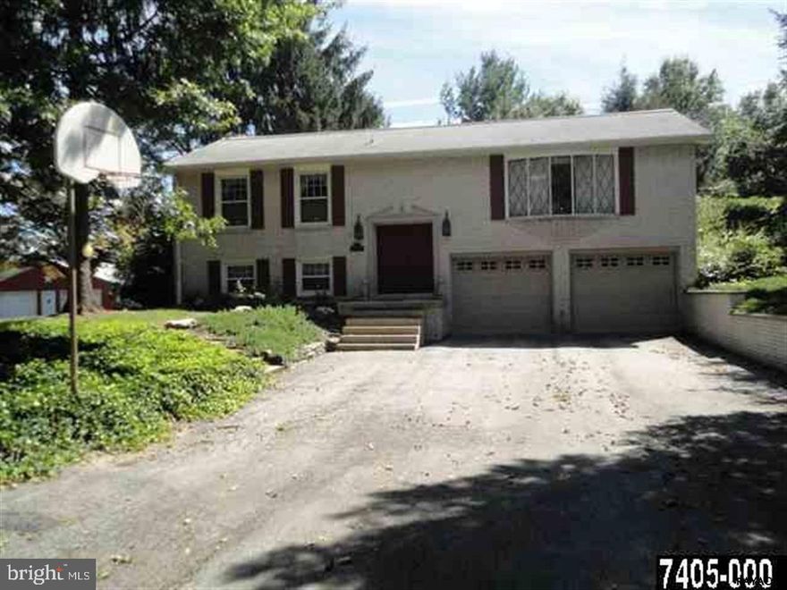 Private, private, private! Rustic, well-built bi-level, on 1 acre, nestled in cul-de-sac! Perfect for growing family! Plaster walls, wide plank wood floors, 4BRS, 2BA, KIT w/ breakfast bar, sunroom overlooking tranquil yard! Garden shed & play house ready to be restored. Det. heated 3rd garage w/workshop. LL has FR w/ optional 4th BR & laundry. Worth a look!