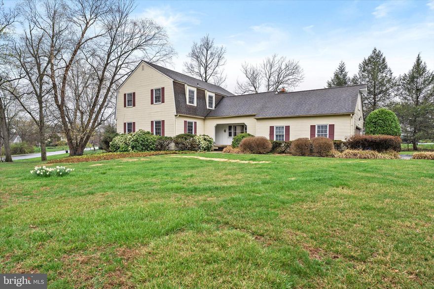 Nestled on a desirable corner lot in the beautiful Mount Eyre Manor neighborhood of Washington Crossing with a BRAND NEW Kel Tran Water Filter System. This spacious and elegant 4-bedroom, 2.5-bath carriage home offers a perfect blend of charm and modern convenience. The inviting first floor features a grand sunken family room with hardwood flooring, vaulted ceilings, built-in bookshelves, and a beautiful brick fireplace with a hearth. The expansive eat-in kitchen boasts custom cabinetry, a built-in microwave, a tile backsplash, recessed lighting, a window seat with plantation shutters, and elegant crown molding. A formal dining room with chair rail and crown molding, a huge living room with hardwood flooring, and a welcoming foyer complete the main living spaces. The first-floor laundry room offers a utility sink, cabinets, and direct access to the backyard, while a stylish powder room with tile flooring and an upgraded mirror adds extra convenience. Upstairs, the primary suite features hardwood flooring, chair railing, a walk-in closet, and a private bath with dual sinks, tile flooring, and a stall shower. Three additional generously sized bedrooms, all with hardwood flooring, share an updated hall bath with tile flooring, dual sinks, granite countertops, upgraded faucets, and mirrors. A second-floor laundry room adds practicality to this well-designed layout. The full unfinished basement offers endless possibilities for additional living space or storage. Outside, the private backyard with a spacious deck provides a perfect setting for relaxation or entertaining. The home also includes a side-entry 2-car garage and comes with a one-year home warranty for peace of mind. Located in the highly sought-after Council Rock School District, this home combines timeless elegance with modern amenities in a prime location. A must-see!