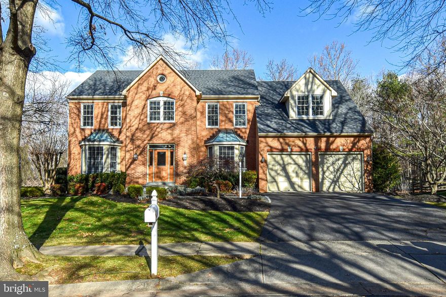 Beautiful home in sought-after Rose Hill Falls. The home is on a prime lot, situated on a friendly cul-de-sac at the top of the neighborhood backing to city protected land full of mature trees. From the front entry, you're welcomed by gracious foyer that continues into a jaw-dropping two-story family room with a floor-to-ceiling stone gas fireplace. Widened doorways on the main level offer an open floor plan for optimal flow and enjoyment. The enormous eat-in kitchen opens to the family room and has a sliding door to the rear exterior 200sf flagstone patio and fully-fenced backyard. There's also a mudroom (with front-loading washer & dryer) from the kitchen that leads to the two-car garage. The home's top level has four generous bedrooms, including a primary bedroom with a large custom-built walk-in closet, full bath with floating tub and separate shower, and a sitting area for reading, relaxing and/or watching tv. The home's lower level features a walk-out to the backyard, a nice bedroom, a full bath, and space for unlimited entertainment possibilities. There's also a storage room with built-in shelving. Rose Hill Falls is a very desirable neighborhood. Community residents can enjoy pretty landscaping, walking-jogging trails, a tot lot, tennis courts, and basketball court. The MS (one block away) & HS are just short walks. The Red Line Metro is six blocks away. It's an easy 10-minute stroll to the popular Rockville Town Center filled with restaurants, shops, a movie theater, library, winter skating rink, summer music/entertainment stage, and the county seat. Saturday's Farmer's Market is just across from the court buildings off the town center. Many updates have been completed (i.e. roof, windows, h/w heater, flooring, appliances, bathrooms, kitchen, etc).