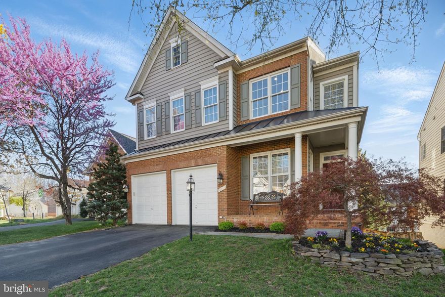 Welcome home to this beautiful Charleston model in the desired Prince William Town Center neighborhood. Enjoy the brick front porch that overlooks a newly landscaped front yard. Enter into a 2-story foyer with an open floor plan,10’ ceilings, new hard wood floors and freshly painted. This level includes an office, dining room, sitting room, family room with fireplace, and gourmet kitchen with an island and eating area. Off the kitchen is a deck overlooking a fenced-in back yard.

The upper level includes a large Primary Suite with 2 large walk-in closets, as well as a sitting area and fireplace. The primary bathroom includes a Jacuzzi tub, large shower and separate vanities. There are 3 more bedrooms, hall bathroom, laundry room and loft overlooking the main entrance. This floor also has all new carpet and has been freshly painted.

On the lower level you will enjoy a family room with a pellet stove for warmth in the winter or just to watch the fire, a projection TV, and a wet bar with new refrigerator and beverage fridge. The additional room has a large walk-in closet and full bathroom. It can be used as an extension to the family room, a game room, sitting room or add a door to make it the 5th bedroom. The family room door walks out to a patio where you can sit and enjoy the back yard.

You don't want to miss this one!