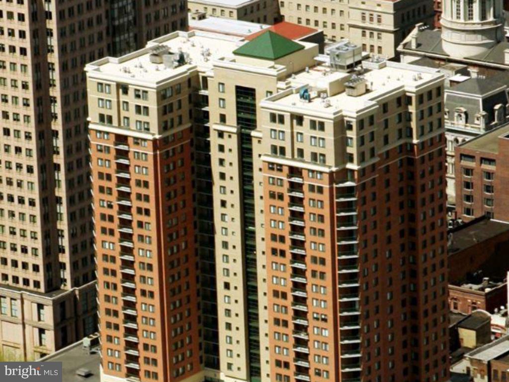 Discover luxury living in this fully renovated 2-bedroom, 2-bathroom condo located in the heart of Baltimore Harbor. This upscale residence features beautiful hardwood floors throughout main area, a modern kitchen equipped with stainless steel appliances, and upgraded bathrooms. Enjoy the convenience of a separate dining area and an in-unit washer and dryer. Relax on your private balcony off the spacious living room. Both bedrooms offer ample storage with built-in closet shelves, while the primary bedroom boasts an ensuite bathroom and a walk-in closet. The building amenities are second to none, including a state-of-the-art gym, concierge services, and a stunning rooftop pool. Secure parking is available in the on-site garage. Don't miss the opportunity to call this luxurious condo your new home!