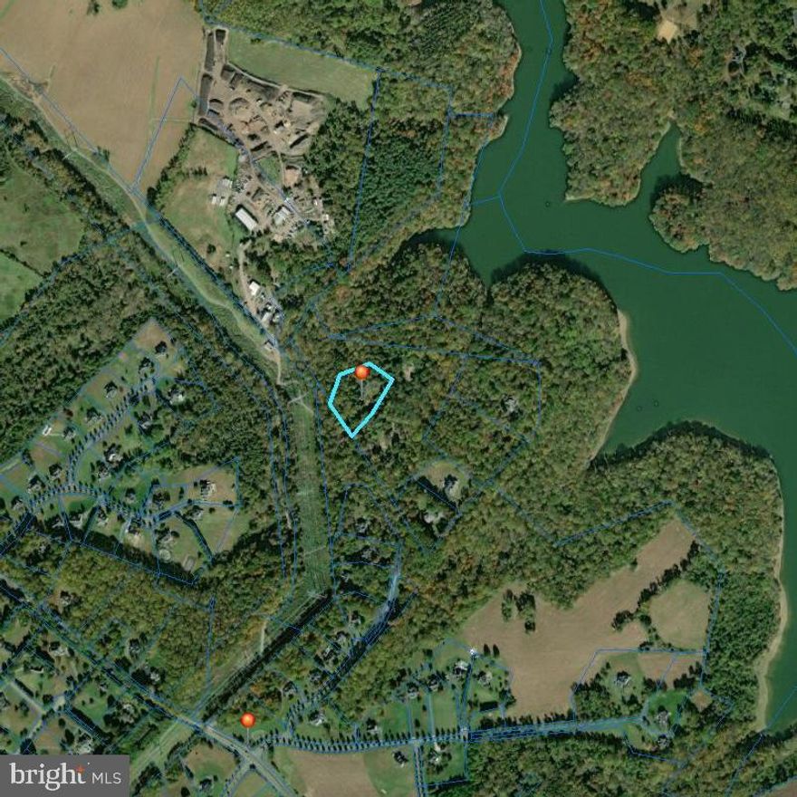 Wooded building lot perk approved Buyer to drill well. This lot and lot 4 backs to the Triadelphia Lake watershed, a joint driveway agreement will be drawn up to service both lots. Lot 3 and 4 can be purchased together if needed.