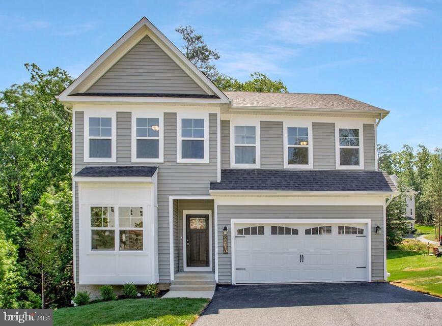 Available for IMMEDIATE Delivery!!
Discover the Monroe, a thoughtfully designed home nestled in the established and welcoming community of The Woods of Rue Purchase. This brand-new construction offers the perfect blend of modern comfort and timeless appeal. Enjoy an open-concept layout that seamlessly connects the living room, dining area, and kitchen, creating an inviting space for both relaxation and entertaining. The heart of the home features a large kitchen island, ideal for meal preparation and casual dining. Equipped with stainless steel appliances and ample cabinetry, it caters to both everyday cooking and special occasions. A bay box window enhances the front room, offering abundant natural light. This flexible space can serve as a home office, library, or any function that suits your lifestyle. Retreat to the spacious owner’s suite, complete with a walk-in closet and a luxurious en-suite bathroom, providing a serene escape at the end of each day. This home features an unfinished basement that is roughed in for a future bathroom, offering you the flexibility to design and complete the space to suit your needs.
Situated in the growing area of Lexington Park, The Woods of Rue Purchase offers convenient access to shopping, schools, and the Naval Air Station Patuxent River.