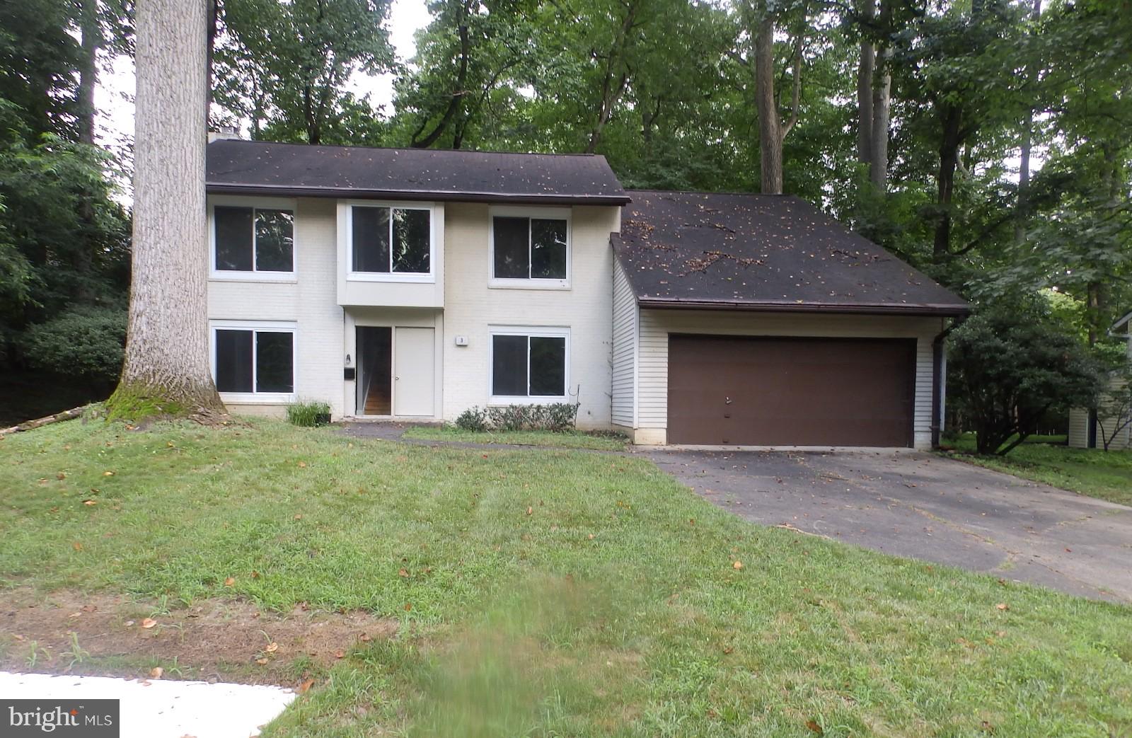Priced below recent appraisal, motivated seller. A Rare Opportunity in a Highly Desired Neighborhood! Tucked away on a quiet cul-de-sac, this charming 4 Bedroom, 2.5 Bathroom 2-car garage all-brick colonial offers timeless appeal with modern updates. Freshly painted and move-in ready, the home features brand-new appliances and an open-concept kitchen that flows seamlessly into the spacious living room – perfect for everyday living and entertaining. Upstairs, you'll find a bright and airy primary suite with vaulted ceilings, floor-to-ceiling windows, an oversized closet, and a beautifully appointed ensuite bath with double vanities. Three additional generously sized bedrooms and a full hall bath complete the upper level. Hardwood floors run throughout, complemented by a welcoming tile foyer and a cozy wood-burning fireplace. Step outside to a private rear patio surrounded by mature trees – ideal for grilling or relaxing in peace. Enjoy the unbeatable location, just minutes from shops, dining, and commuter routes like the metro and I-270. The neighborhood also offers sidewalks, a community pool, playground, and open green spaces. Don’t miss your chance to own in this rarely available enclave!