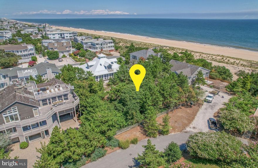 Almost oceanfront and exceptionally located, this rare 100' x 100' vacant lot in the coveted private beach community of Indian Beach offers the perfect setting for your coastal dream home. Positioned directly across from the dune crossover, you’ll enjoy unobstructed ocean views and be just steps from the private beach. Depending on your home design, there’s also the potential for beautiful Rehoboth Bay views. Tucked just south of the energy of Rehoboth and Dewey Beach, this homesite delivers the best of both worlds—close to dining, shopping, and entertainment, yet set apart in a more peaceful seaside enclave. 9 Hall Avenue, Rehoboth Beach, DE — a standout opportunity to build in one of the area’s most sought-after ocean-adjacent communities.