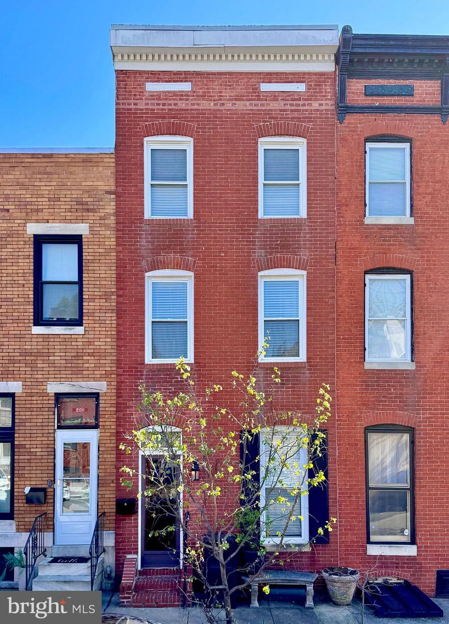 Start your day on a brand-new rooftop deck with panoramic water views in this incredible Upper Fells Point townhome, where historic charm meets modern upgrades. The open-concept main level features new hardwood floors, fresh paint, and a renovated kitchen with stainless steel appliances—plus a powder room and in-unit laundry. Upstairs, a large primary bedroom, beautifully renovated bathroom, and bonus loft offer plenty of living space. The third floor provides two more bedrooms and a new two-story deck, while the unfinished basement offers flexible storage or gym potential. Private parking is available for lease—an enviable perk in this sought-after neighborhood. Minutes from Patterson Park, top dining, boutiques, and the waterfront promenade—with major commuter routes close by—this home is a must-see. Schedule your private tour today! ONE YEAR OF RESERVED PARKING INCLUDED (RENEWABLE AND ONLY ONE BLOCK AWAY FROM THE PROPERTY).