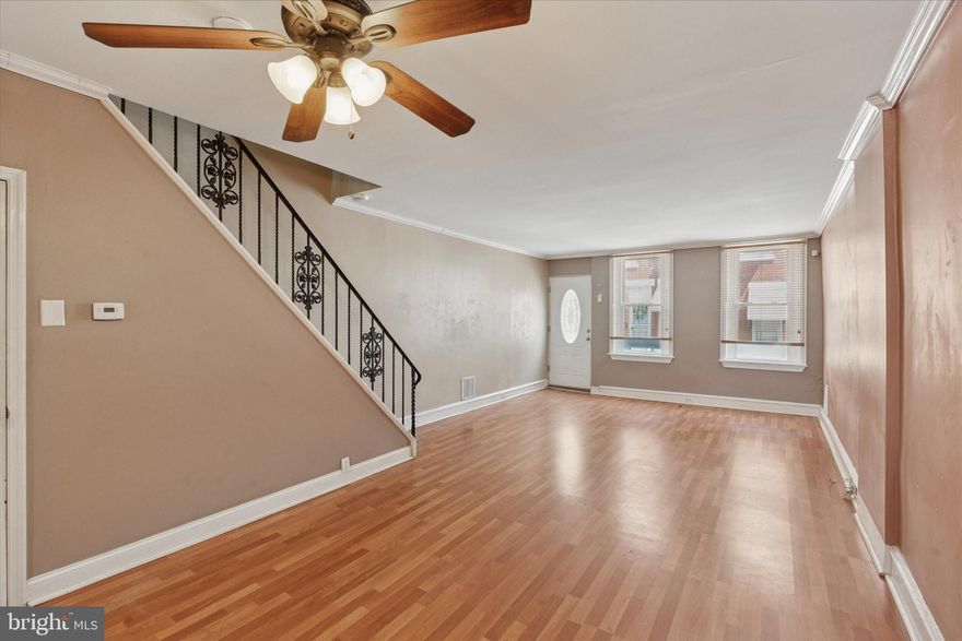 Spacious & Affordable Gem in a Prime Location! Welcome to this generously sized and budget-friendly home that offers the perfect blend of space, potential, and value. With bright natural light, original charm, and versatile rooms, this home is ideal for growing families, savvy investors, or first-time buyers looking to maximize square footage without breaking the bank. The kitchen boasts stainless steel appliances—including a dishwasher—ample counter space, generous storage, and even a dedicated pantry. There's enough room to create a cozy breakfast nook right in the kitchen. Just off the kitchen, the dining room offers the perfect setting for sit-down meals. The spacious living room easily accommodates a large sofa, chairs, and more—ideal for relaxing or entertaining. Upstairs, you'll find well-proportioned bedrooms with ample closet space, ceiling fans, and large windows that bring in abundant daylight. There is even a primary bedroom suite with its own full bath. Amazing!  The fresh, neutral palette and durable wood-look flooring offer a move-in-ready feel with room for your personal touch. The basement adds tremendous value — its large, dry, and partially finished, offering fantastic storage, a dedicated laundry area, and plenty of potential to create a workshop, gym, or entertainment space. The backyard is perfect for BBQ's, gardeners or sun worshippers alike.Conveniently located near major retailers along Columbus Boulevard, including Target, IKEA, Marshall’s, Giant, and Acme—everything you need is just minutes away. Enjoy nearby green space at Mifflin Square Park, and take advantage of several bus lines within a few blocks for easy commuting. Satisfy your cravings at local favorites like Wolf Burger, Southside Bar & Grill, and La Canasta Mexican. All this on a friendly block at an unbeatable price. Don’t miss your chance—come see it for yourself!