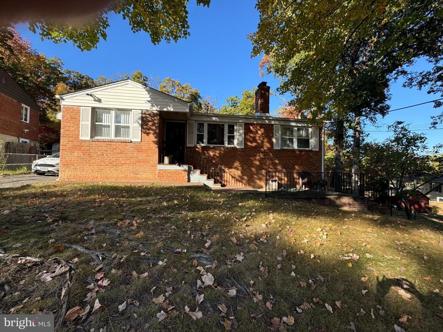 This brick home in nestled conveniently located near the metro and shopping. Main level is 3 bedrooms and a full bathroom. The basement is an open slate for another bedroom and 2nd bathroom. Bring your cosmetic updates to this gem.