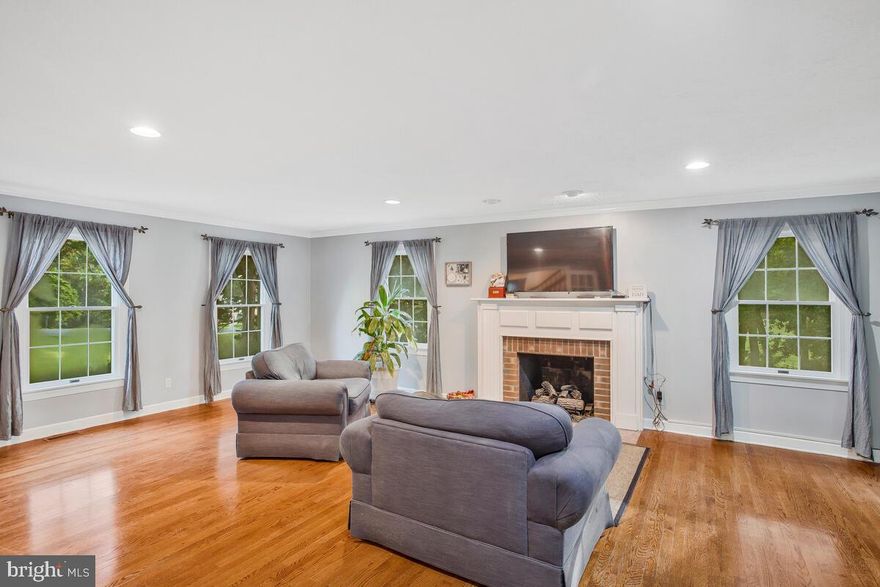 Enjoy 2.6 acres of a Huntingtown, mature tree lined open space lot, with an over 3500 Sq.ft home. As you pull in the driveway, you will see how large and open the lot is and as you park you will see the area for the secluded in-ground pool. Step in the front door and notice how much natural light fills the entertainment space of the oversized family room with fire place and easy access to the plus sized Florida room. Head over to the open eat in kitchen and notice the large library/office space off the front of the home. For the entertainer in you, head downstairs and enjoy your open finished basement, with second fire place and full sized bar top. Let the party continue with easy access to the side yard, and pool. When it is time to retire for the evening, head upstairs to the large owners suite with full sized bath and soaking tub. The 4th bedroom was converted to an oversized walk -in closet. If you want the 4th bedroom, it would be easy to convert it back to hallway access.  All other bedrooms, to include laundry, are on the same floor as the owners suite. Excellent location with easy access to Rte 4!