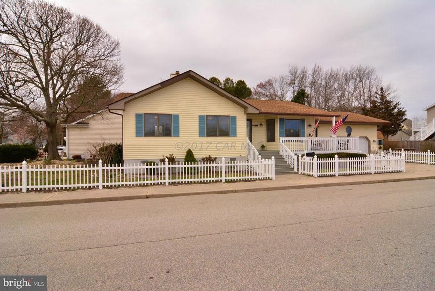 Spacious, upgraded, single family home 2 blocks from the ocean with no HOA or Condo fees!  New flooring, appliances and upgraded space including: large laundry room, extra pantry space for the kitchen, and a breezeway turned into a sunroom.  The beach, the movies and great restaurants are only steps away.  This immaculately maintained home on a large corner lot could be yours to enjoy all year!  New HVAC to be installed 2/4/2018.  10 year warranty transferrable in first 90 days.