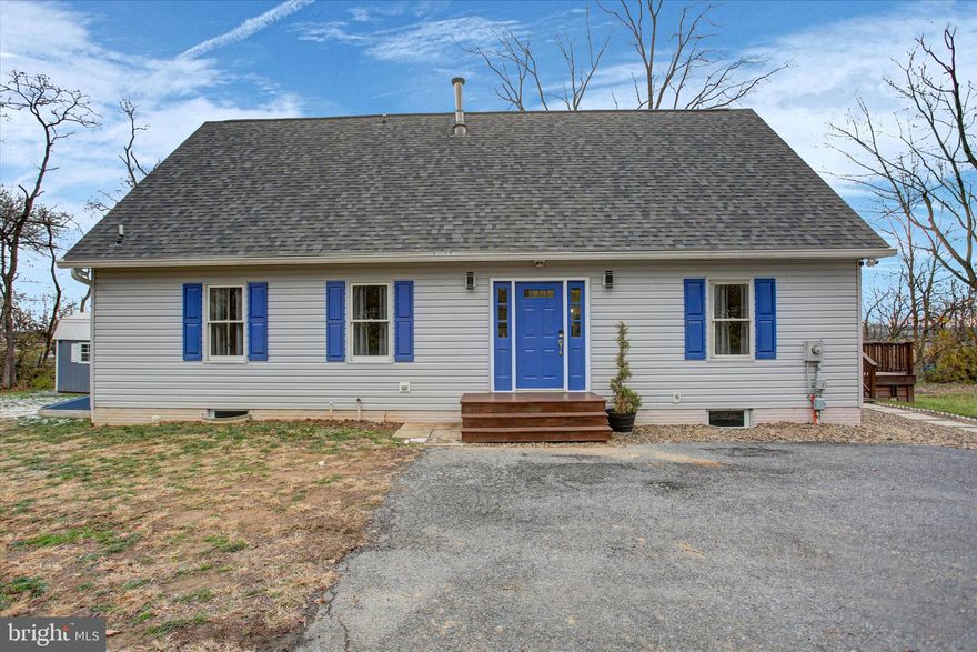 Need a larger home on a larger lot? Desiring something a little more modern but lots of classic charm?  This 4 bedroom A frame home is just what you are looking for!  Situated on a little over an acre and lined by trees (which will be quite darling come spring time) this home offers something for everyone!  When you walk inside you can admire the open floor plan and all the natural light that comes in through the bay window.  The flooring is seamless throughout and each room has a clear purpose.  The kitchen is truly a show stopper boasting enough room for a huge island and space for a built in coffee bar!  The pantry is massive and the mudroom area off the wrap around porch is the perfect dumping grounds for everyone's belongings. Need one level living?  This home has it!  The primary suite is on the main level and it features its own walk in closet, a nook for a beauty station, and an attached full bathroom.  There is another bedroom and full bathroom on the main level along with the laundry.  Upstairs you will be blown away by the bedroom sizes.  Between the two bedrooms is a large foyer area and a full bathroom with an amazing custom tiled shower! Need even more space?  There is a full unfinished basement that is currently used for additional hangout space as well as storage.  The ceiling height is great and could easily accommodate a drop ceiling plus there are walk up steps to the backyard! When the trees start to bloom, you will definitely enjoy the privacy of the large wrap around deck.  There is also a shed for lawn equipment and a really great size yard in the rear.  Although there is no garage, the amount of parking offered is wild plus there is a circular driveway for easy access onto the main road. Don't let this one slip by! Schedule your tour today!