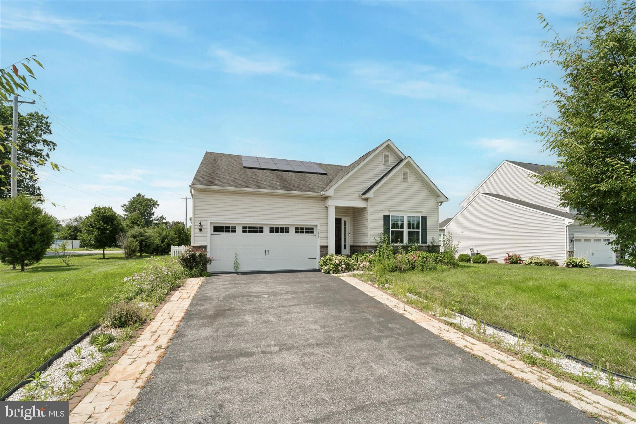 Say goodbye to compromises—this corner lot home checks every box. Outside, a large front yard with beautiful, green grass greets future homeowners. A large 2-car garage and driveway provides ample parking. Head inside through the front door and into the foyer, where dark LVP floors guide you past a French Door office space and into the main living area. There, plenty of natural light floods the open floor plan—promising beautiful sunlit mornings with your favorite cup of coffee. The kitchen is perfect for entertaining thanks to a large island that can double as a breakfast bar. Dark cabinetry juxtaposes the otherwise bright space. On the main level, homeowners will also enjoy a laundry room with a front-loading washer and dryer. The two bedrooms are also on this floor. The primary evokes a luxe aesthetic with high, tray ceilings, closet space, and an ensuite bathroom with a walk-in shower. The second full bathroom also features a walk-in shower and updated look with a light wood vanity and black fixtures.
Downstairs, a fully finished basement adds ample living space. Recessed lighting provides plenty of light, and an accent mantel acts as the perfect spot for your TV and couch.
Back on the main level, walk outside to the modern deck with black fencing that overlooks a vast green space. A gazebo adds shade to the otherwise sunny area. A decent-sized yard awaits below—which would work great as a plays pace or gardening area. White vinyl picket fence keeps the area private and enclosed. There is also a shed for added storage, if needed.
Located in Coatesville, the property is less than a mile away from Millview Park—perfect for walking or enjoying fresh air with family—and is a short drive from Hibernia County Park and ChesLen Preserve, where you'll have access to trails and picnic areas. For commuters, the home is located near major roads including US-30 and PA-82, making commuting to Philadelphia and West Chester a breeze. For those looking for public transportation, it is less than a mile to Coatesville Amtrak Station. Plenty of grocery stores and casual restaurants are also nearby.
Schedule your tour today!