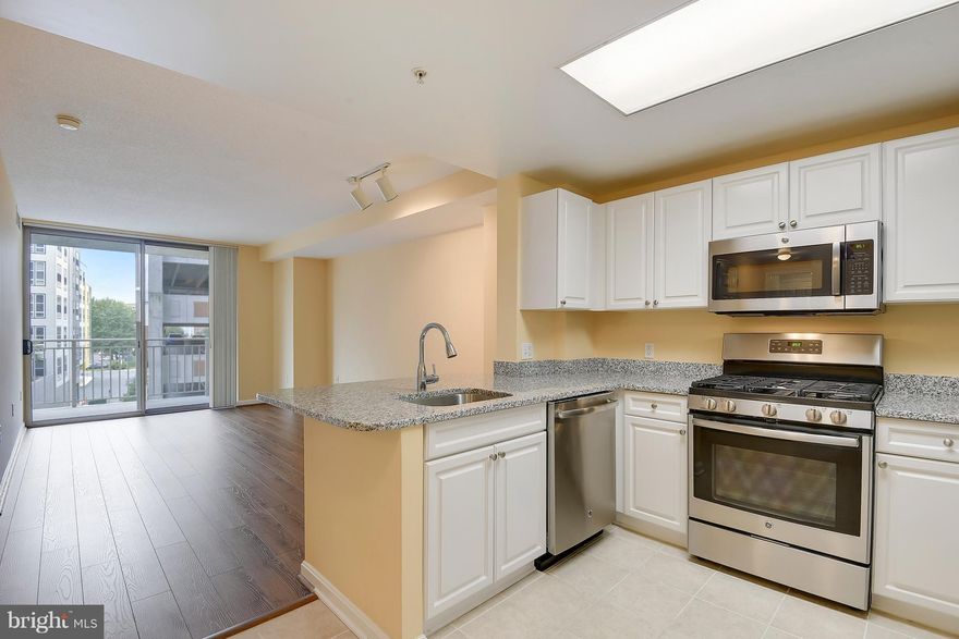 6  or 18 Month Rental. This Fantastic 2 bed/2 bath condo features granite counters, stainless appliances in a remodeled kitchen w/island seating. Wood flooring. Freshly painted. Garage parking, 24/7 security, rooftop pool, gym & more. Across from Dunn Loring Metro & Harris Teeters. Mosaic District, lots of shopping & restaurants all around. Fantastic location. 2nd Parking Spot Available.