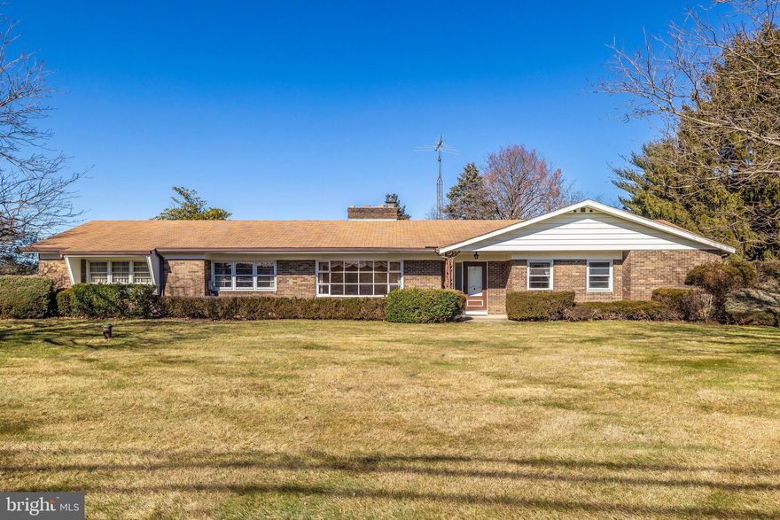 Explore this charming 4-bed, 2.5-bath home spanning 2,184 sq ft on the main level and plus a full basement. The chef’s kitchen features a cooktop, two wall ovens, granite counters, pantry storage, and Italian ceramic tile flooring. Convenient mud room/laundry room with added pantry storage. Inviting living spaces include a family room with a wood-beamed ceiling and a wood-burning fireplace, a sunken living room with a fireplace and bow windows, and a dining area with built-in cabinets. Hardwood floors grace the living and family rooms. The full basement offers a spacious 14’x31’ recreation room and a 14’x22’ finished carpeted room with a closet. Additional abundant storage is found in the basement, including a generous 12'x52' storage room and an 8'x15' storage room, previously used as a cold room for canned goods and wine.  Attached 2-car garage plus an oversized detached 2-car garage with an oil furnace, and a spacious unfinished 25’x35’ room above. Asphalt driveway with turn-around. Zoned oil hot water baseboard heat, central A/C, whole-house vacuum. Recent upgrades: exterior paint (2023), remodeled basement, new copper pipes, gutter guards (2022), and a new oil tank (2021). Rear porch and fenced backyard are perfect for the whole family. Don’t miss the chance to make this your home!