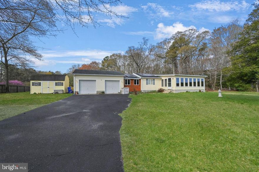 Welcome home to peaceful Georgetown living on 1.28 acres! This inviting 3-bedroom, 2-bath property offers the perfect blend of space, comfort, and modern upgrades—complete with an attached 2-car garage. Inside, you’ll love the functional layout featuring a bright kitchen with stainless steel appliances, a breakfast bar, and a dining area just off the kitchen—ideal for everyday meals or entertaining. The main living room flows into a second sitting area filled with windows, creating the perfect spot to relax and enjoy views of the outdoors. Step outside to a fenced backyard with plenty of room for pets, play, or gardening, plus a shed for extra storage. Major updates include a newer HVAC system, tankless water heater, water treatment system, and Tesla solar panels for added efficiency and peace of mind. Don’t miss this opportunity to enjoy country space with convenient access to all that Georgetown has to offer—schedule your private tour today!