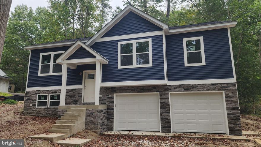 Step into a rare opportunity to bring your vision to life! This beautifully framed and securely enclosed home sits on a private wooded lot, offering the ideal blend of structure and creative freedom. With the framework completed and the drywall in place, you’re perfectly positioned to take the reins and make this home truly your own.

Now is the perfect time to personalize the last few details like elegant flooring, stylish cabinetry and stunning countertops.

Imagine the satisfaction of moving into a home where every corner has your signature style. Don’t miss your chance to turn this promising property into the perfect haven.

Call your agent today for more details!