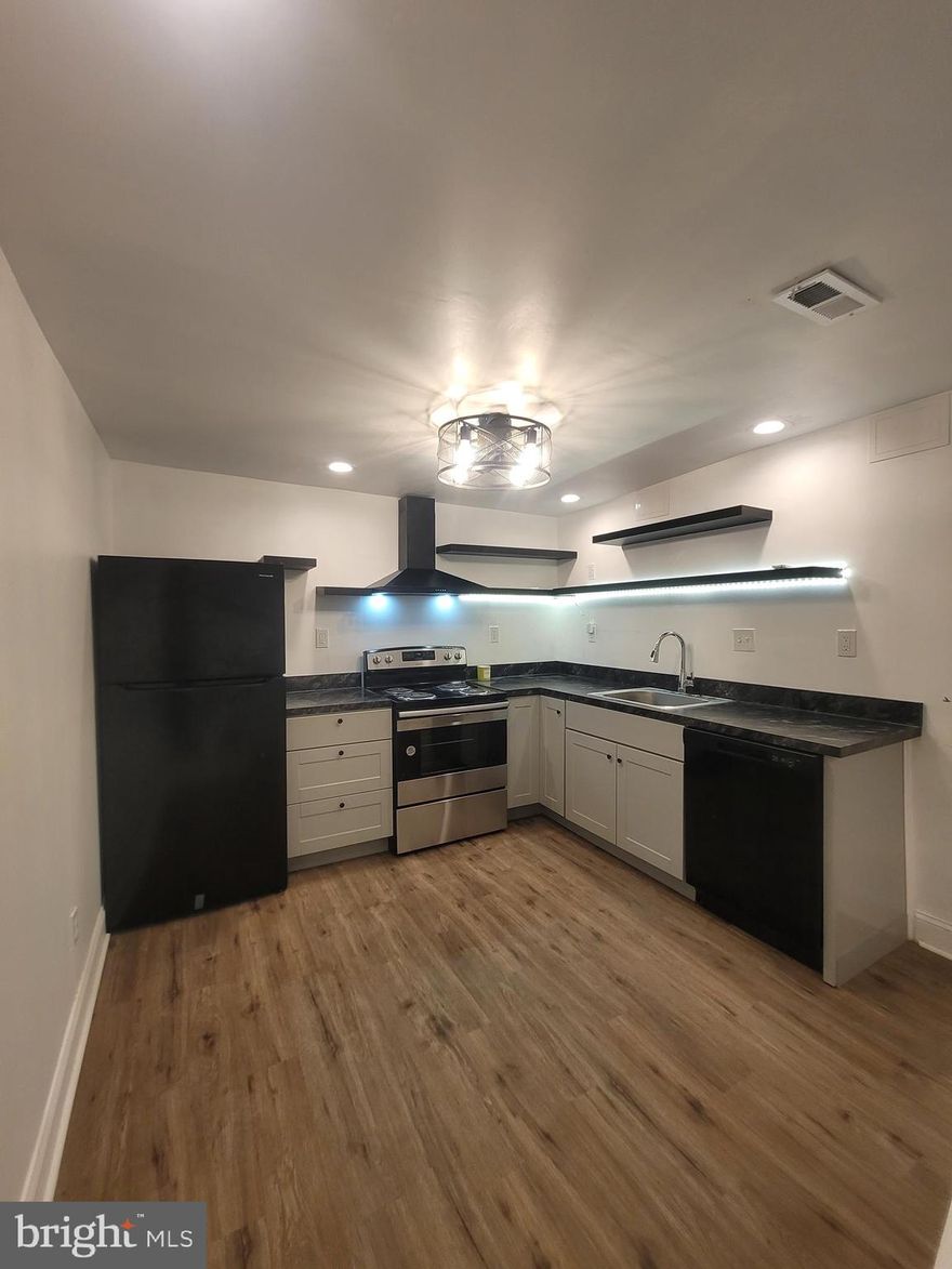 Come see and lease this spacious bi-level, one bedroom apartment with new finishes and appliances, including a main level powder room, remote controlled ceiling fans, dishwasher, and en suite washer and dryer.  Pet-friendly, with backyard and basement access, unit 1 at 2314 Cecil B Moore is in a great walkable location with easy access to parks, Rt 76, Ridge Ave, southeast to Center City Philadelphia, northwest to East Fall and beyond. Same day tours available now. HCV/Section 8 excepted.