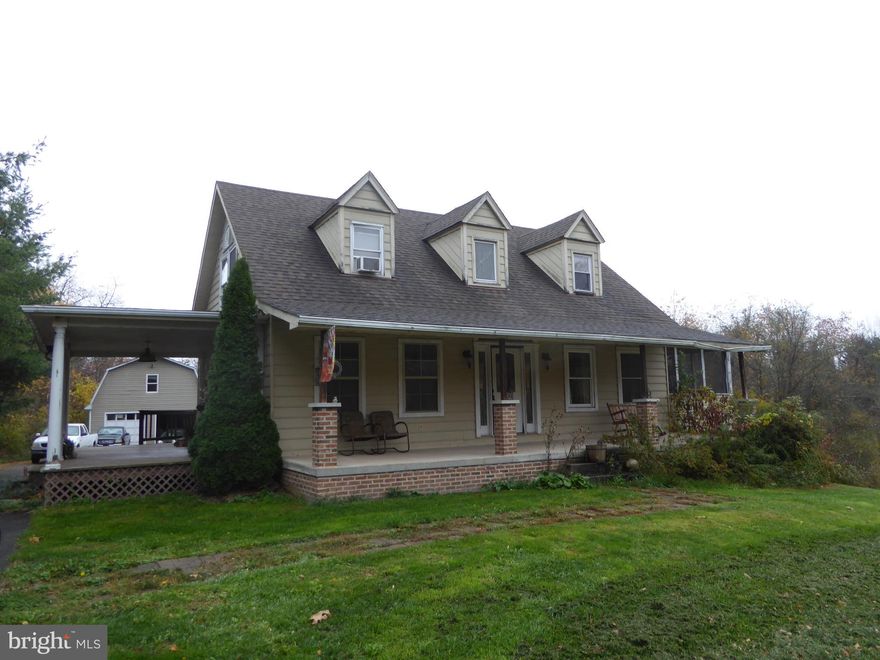 CALL TODAY TO SEE THIS HOME THAT OFFERS OVER 2,000 SQ FT OF LIVING SPACE WITH 4 BEDROOMS AND 3 BATHROOMS. IT FEATURES A NICE SIZED KITCHEN AND ONE BEDROOM ON THE MAIN FLOOR. NEED EVEN MORE SPACE? THERE IS A BASEMENT WITH A FIREPLACE AND WOODSTOVE JUST WAITING FOR YOU TO FINISH.  THERE'S AN APARTMENT ABOVE THE OVERSIZED 2 CAR DETACHED GARAGE IT NEEDS  SOME TLC . YOU CAN ENJOY THE PEACEFUL SOUNDS OF NATURE OR TAKE IN THE MOUNTAIN VIEWS FROM THE LARGE COVERED PORCH. THERE  ARE  2.85  ROLLING ACRES  WITH TREES AND A POND THAT NEEDS SOME CLEARING . THIS HOME IS LOCATED IN THE HEART OF HAMPSHIRE COUNTY AND IS A CONVENIENT 45 MINUTE COMMUTE TO ALL THE AMENITIES OF WINCHESTER, VA.