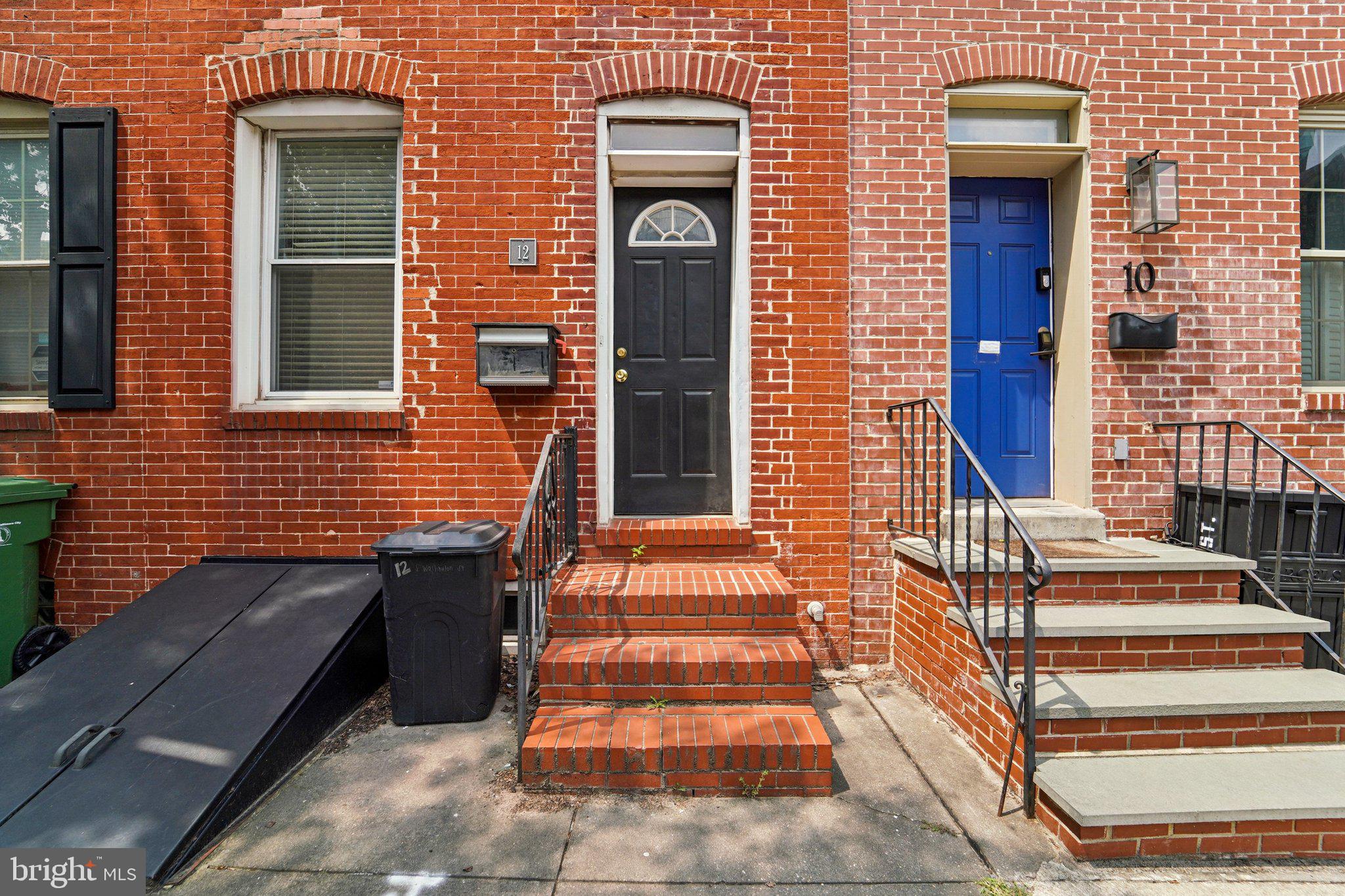Charming and Updated Row Home in the Heart of Baltimore! Welcome to 12 Washington St — a beautifully maintained interior row home offering a perfect blend of modern updates and classic charm. Step inside to find gleaming hardwood floors throughout and an inviting main level featuring a spacious living room, a convenient half bath, and a dining room that flows seamlessly into the updated kitchen. The kitchen boasts stainless steel appliances, granite countertops, a subway tile backsplash, and access to a private deck — perfect for morning coffee or evening relaxation. Elegant crown molding and recessed lighting enhance the main level’s appeal.
Upstairs, the second floor offers one bedroom and den area, and a full bathroom, while the third floor provides an additional bedroom, ideal for guests or a private retreat. The partially finished basement expands your living space with a bonus room that can serve as a bedroom, office, or entertainment area, along with a full bathroom, dedicated laundry area, and plenty of storage.
Located close to shops, dining, and all the attractions Baltimore has to offer, this home is move-in ready and waiting for you!
Mortgage savings may be available for buyers of this listing.
