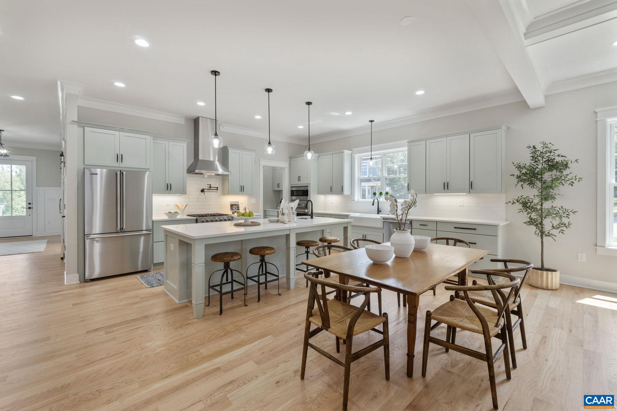 OPEN HOUSE SUNDAY, July 27, 1-3pm! Ease into the day with park and mountain views from the primary bedroom deck of this exquisite new construction home. Gibson Homes presents this just completed home with a cool color palate, stunning finishes and sited on a corner lot, the generous space throughout lives large. 10 ft ceilings on the 1st floor, true finished in place hardwood flooring, natural gas fireplace with shiplap surround and a great room coffered ceiling, Viking appliances in a chef's dream kitchen, custom cubbies, custom built-ins....you may have found your forever home. Along with the primary bedroom, on the 2nd floor find an en-suite bedroom and a jack and jill bedroom ensemble. A 2nd floor laundry room gives ease and convenience to chores. The detached 2 car garage with finished carriage house above can be rented or can be a perfect au pair suite, mother in-law apartment or private office. Owner/agent.,Maple Cabinets,Painted Cabinets,Quartz Counter,Fireplace in Great Room