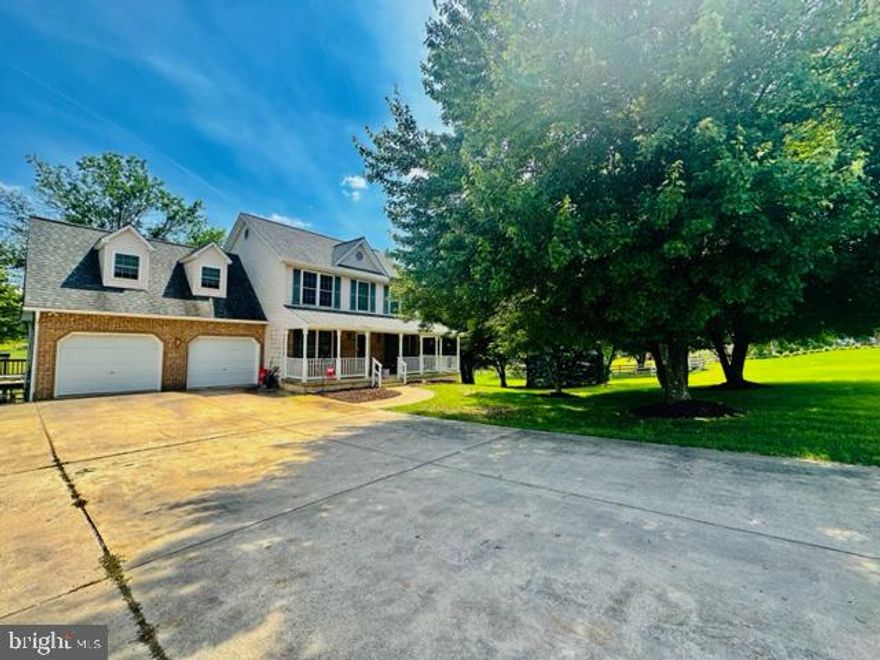 Welcome home to your NEW home!  We proudly offer this well maintained 2 story 4 bedroom, 3.5 bathroom home on  almost 1.5 acres.  This home features a fabulous front sitting porch, center hall layout and design.  You will find a cozy sunken family room with fireplace, living and dining rooms, eat in kitchen with center island, vaulted ceilings, main floor laundry, oversized closets and pantry - all steps from the large garage with shelving and extra storage.  The family room has a pass through from the kitchen that is perfect for entertaining on the large rear deck and screened in porch.  Upstairs, you will find a large primary suite with walk in closets and luxuriously laid out ensuite bathroom.  3 large bedrooms and a hall bath are just down the hall from the primary.  All bedrooms are large and have ample closets.  The lower level basement offers flex bonus space just waiting to be finished.  Gas logs and a brick hearth await your creative direction.  Walk right out to the side and rear yard from the LL.  Maplecrest is a sought after popular neighborhood and the sunsets and mountain views are breathtaking.  Come see for yourself!