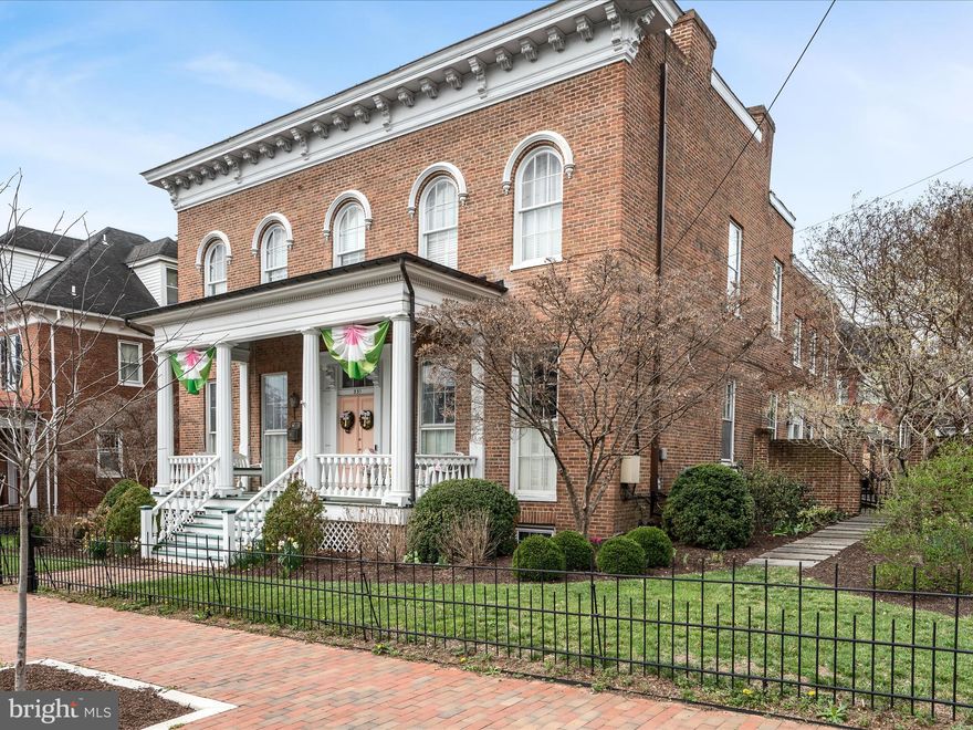 This circa 1863 Italianate home is located in the heart of Winchester's historic district within a short walk to Handley Library and downtown. The home has been elegantly restored, blending timeless charm with modern comforts. The interior is restored to its original grandeur with high ceilings, hardwood floors, decorative moldings, and fireplaces in every room. Fully updated gourmet kitchen with a breakfast room and large mudroom conveniently located next to the back door. The comfortable layout ensures the house is suitable for contemporary living while preserving its historical charm. The primary bedroom boasts a huge closet(not typical for an older house). The covered patio enhances gracious outdoor living. Separate courtyard and level yard. Off-street parking and a garage! Another real rarity in an older home is the finished basement. Yes, all five of the family members graduated from UVA, which explains the decorating theme of the rec room.
The home's historical significance adds to its appeal, offering a unique piece of history and a sense of character that is difficult to find in modern homes.