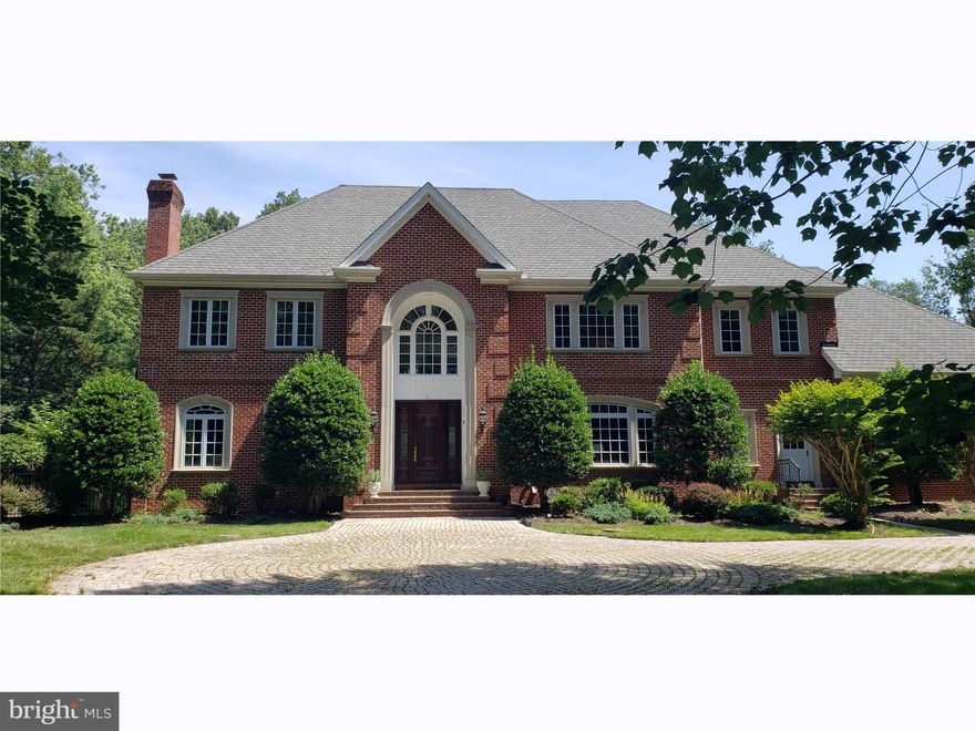 Absolutely beautiful home on large level lot. Four bedrooms upstairs all with en-suite bathrooms. Large sunny kitchen overlooks tranquil rear yard.  Main level has serene paneled office, spacious chef's kitchen, and formal spaces great for fancy entertaining. Then you go downstairs to the lighted performing stage, dance floor and indoor eight seat home cinema theatre for party time.  World class jazz musicians have played in this space. There's an office/den/music lab with full bath downstairs too.  And an exercise room.   The huge 3 car side entry garage has a new epoxy floor for your car collection. The quiet cul-de-sac  location affords sunlight and privacy. Over 9,600 square feet of finished interior space, plus the 920 sf garage.  Current owner is also an architect who is constantly impressed with what the original architect and builder did to create this masterpiece.  Shows like a model home. This is a good one.