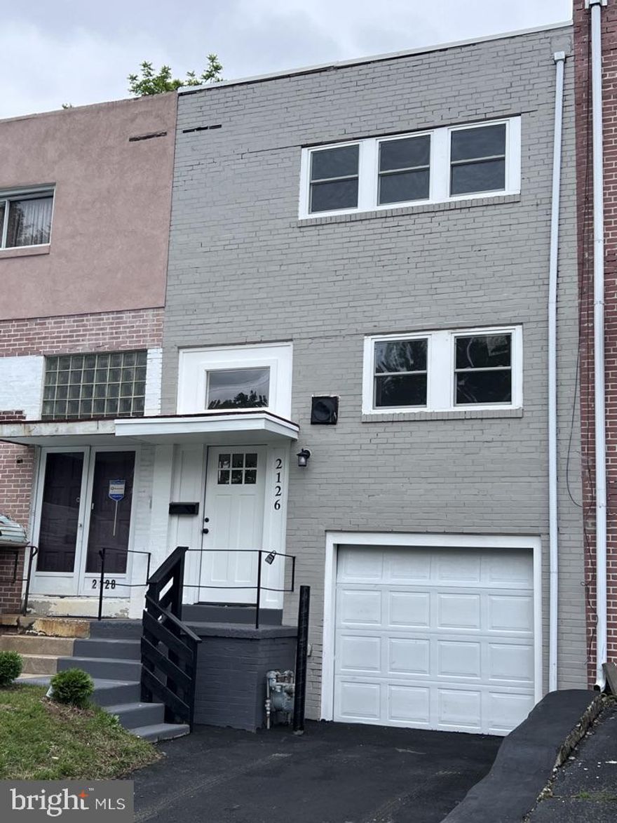 Welcome to 2126 Delmar Drive — a beautifully renovated gem in the heart of Folcroft! This move-in ready 3 bedroom, 1 bathroom residence offers the perfect blend of contemporary updates and comfortable living, ideal for anyone looking for a turn-key home.  Step inside and be impressed by the fresh, modern feel throughout. New flooring and plush carpeting flow seamlessly from room to room, complemented by all-new lighting fixtures and sleek recessed lighting that create a bright and inviting atmosphere.  The stunning, brand-new kitchen is a true showstopper. Featuring crisp white cabinetry, granite countertops, a breakfast bar, modern finishes, and a full suite of brand-new appliances — all included with the sale — it’s a space designed for both cooking and entertaining.  Downstairs, the finished basement provides even more living space and includes convenient access to your private garage, along with a washer, dryer, and utility sink for added ease.  The full bathroom has been fully remodeled with designer tile and elegant finishes, offering a spa-like retreat you’ll love coming home to. Fresh paint throughout the interior and exterior adds to the clean, modern look.  Outside, you’ll find a private driveway, additional street parking, and a fenced-in grass backyard complete with a charming patio — perfect for outdoor dining, relaxing, or entertaining.  Don’t miss your chance to own this exceptional home that truly checks all the boxes. Schedule your private tour today and experience the beauty and comfort of 2126 Delmar Drive for yourself!